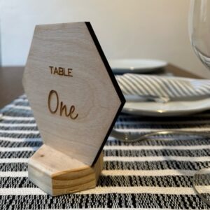 Hexagon shaped wooden personalised table names and numbers