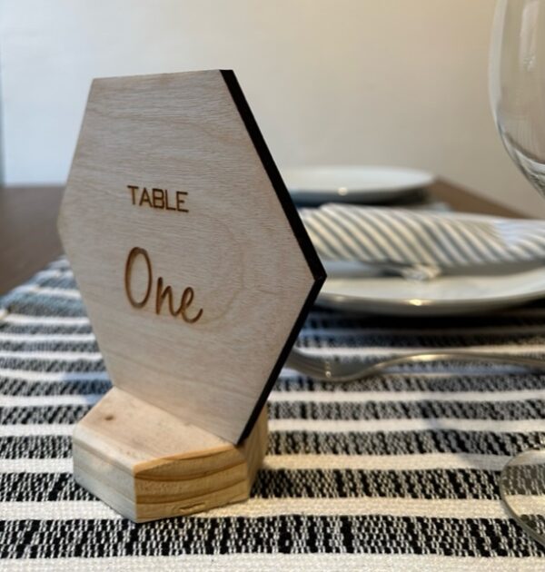 Hexagon shaped wooden personalised table names and numbers